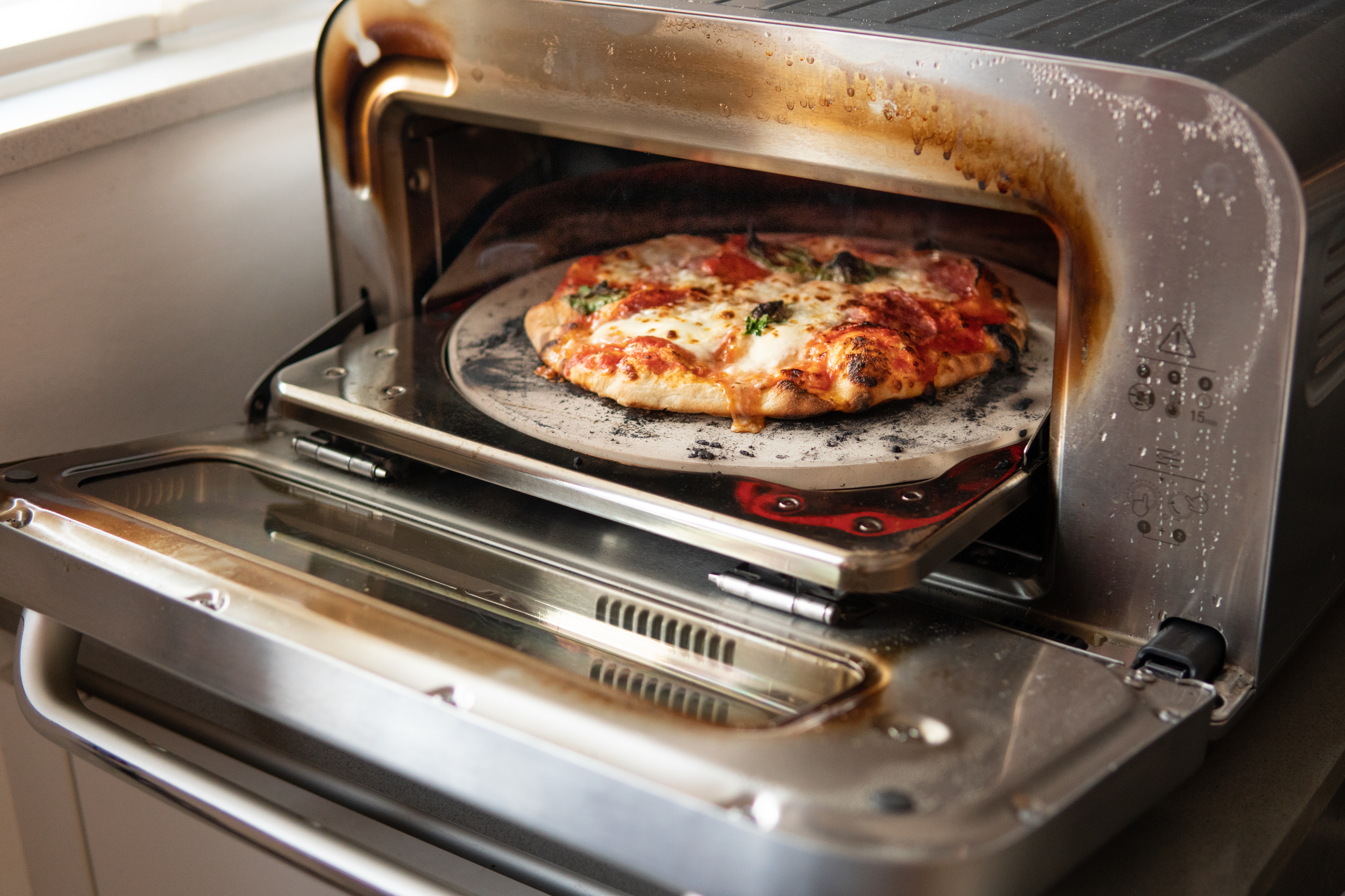 De'Longhi Pizzaiolo オーブン De Smart Oven Pizzaiolo is de pizza-oven van je dromen - Culy