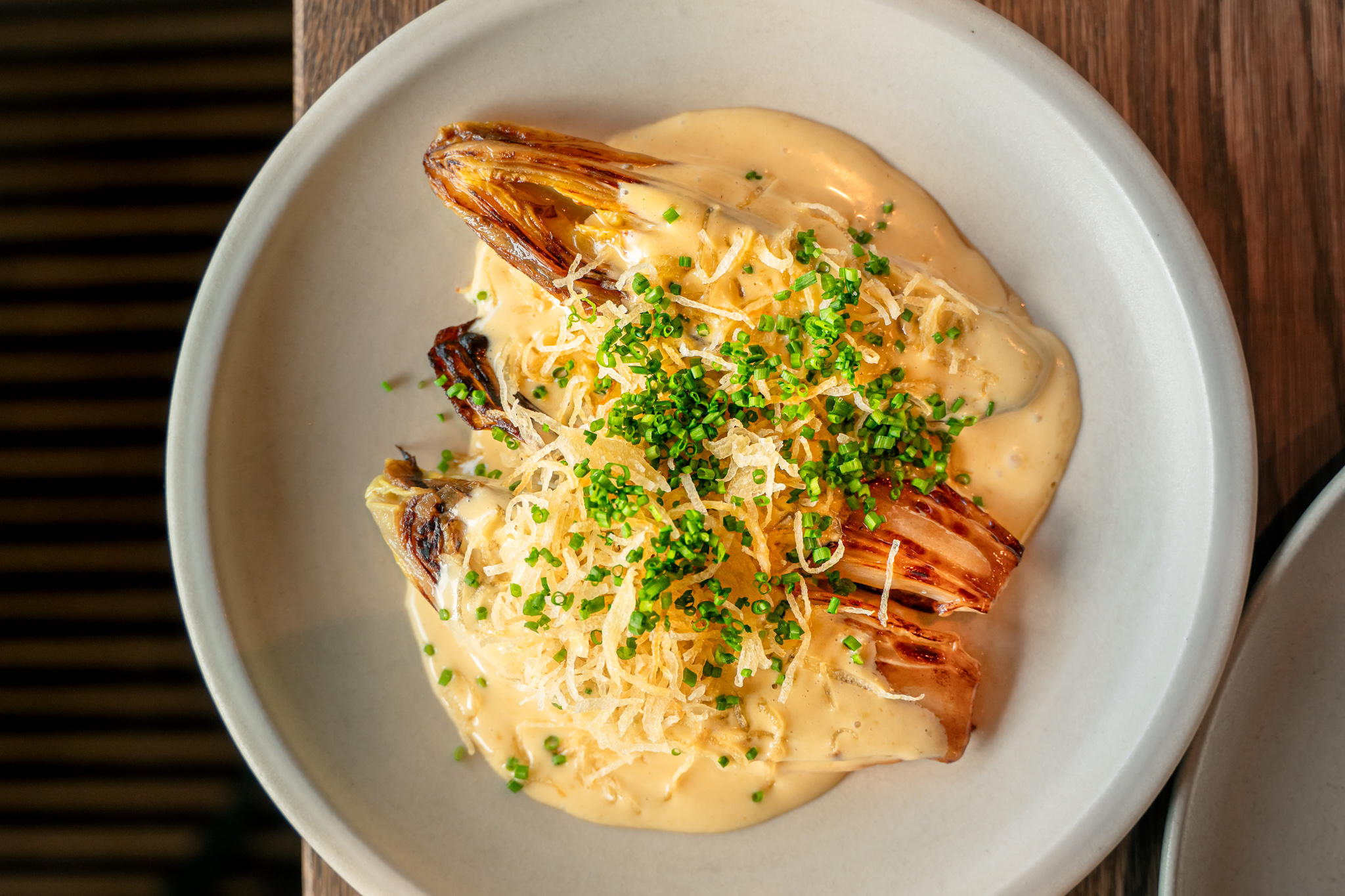 Bijgerecht met witlof bij Larette Amsterdam