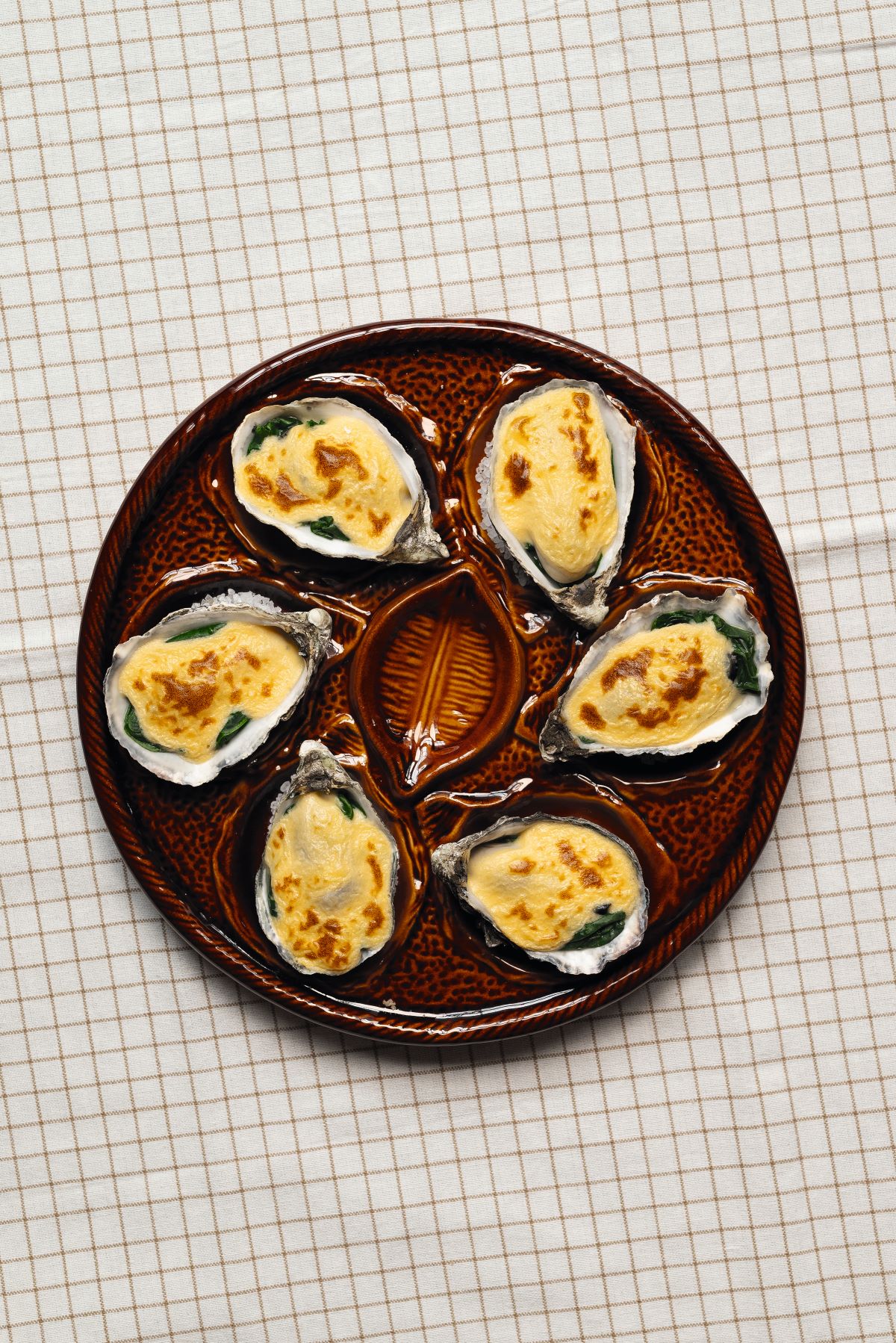 Gegratineerde oesters champagne sabayon