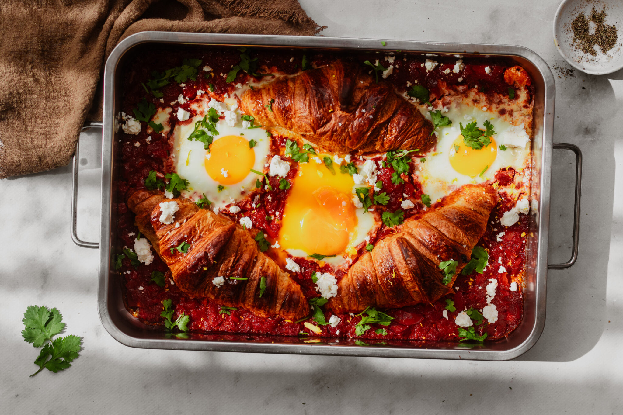 Croissantshakshuka uit de oven | shakshukakruidenmix